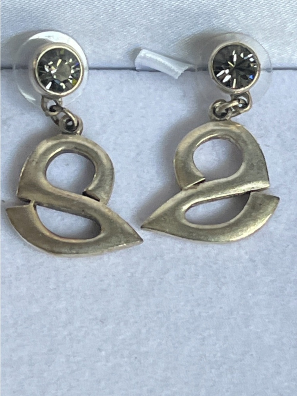 Silver-tone Swirl Drop Earrings with Black Crystal Accents